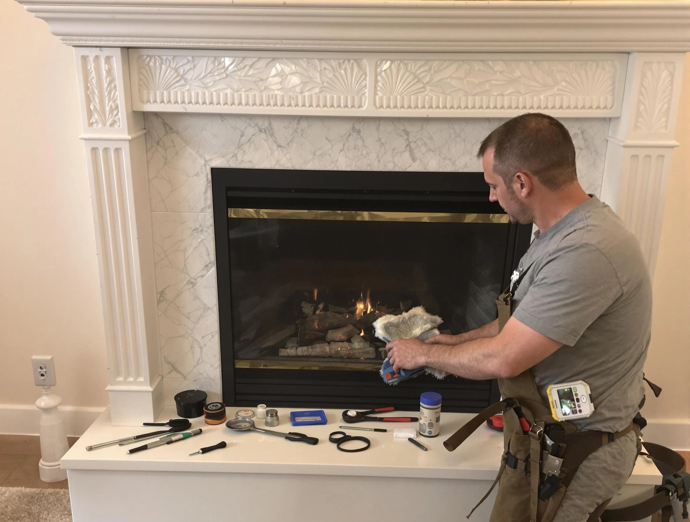 Alpharetta Chimney Sweep performing fireplace maintenance in Alpharetta, GA